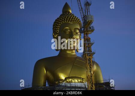 Large Buddha a 69-metre-tall statue with a 40-metre lap has been built at Wat Paknam Bhasicharoen, Phasi Charoen district, in Bangkok, Thailand, on June 20, 2020. (Photo by Anusak Laowilas/NurPhoto) Stock Photo
