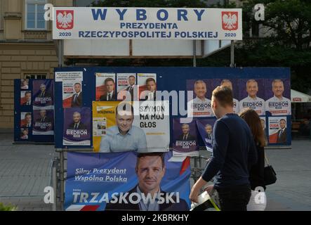 Election posters of Andrzej Duda and Szymon Holownia, seen in Krakow's Main Market Square. On Thursday, June 25, 2020, in Krakow, Lesser Poland Voivodeship, Poland. (Photo by Artur Widak/NurPhoto) Stock Photo