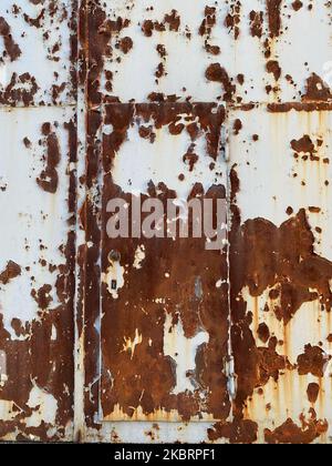 Rusted steel door. background white Stock Photo