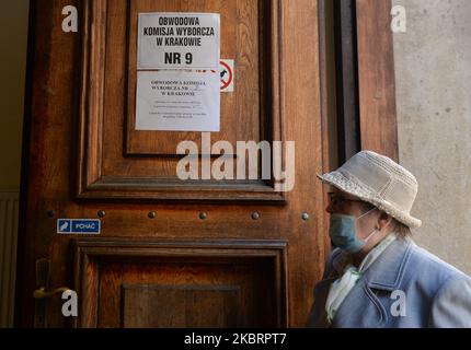 A lady arrives to cast their votes in the first round of presidential elections 2020, in Krakow Polling Station number 10. On Sunday, June 28, 2020, in Krakow, Lesser Poland Voivodeship, Poland. (Photo by Artur Widak/NurPhoto) Stock Photo