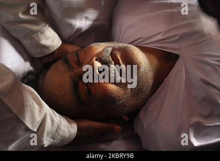 (EDITORS NOTE: Image depicts death.) People perform last rites of a civilian Bashir Ahmad in HMT Srinagar, Kashmir on July 01, 2020.One Indian soldier and a civilian (grandfather) of a three-year old baby were killed after militants attacked patrolling party of Indian soldiers in Sopore area of north Kashmir. A police official told local news agency that the civilian Bashir Ahmad of Srinagar who was carrying a three-year old baby in his lap also died after receiving bullets. (Photo by Faisal Khan/NurPhoto) Stock Photo