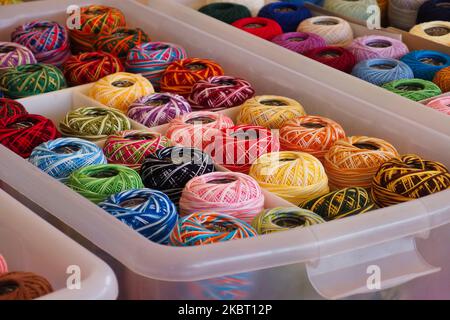Various coloured spools of thread Stock Photo