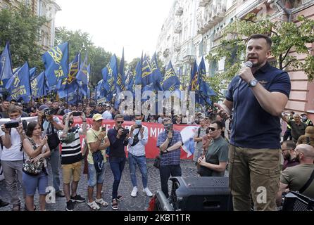 Leader of political party National Corps Andriy Biletsky (R) speaks during a rally of far-right activists of 'National Corps' political party called 'Demand of the Nation - Prohibition of pro-Russian organizations' with demand demand ban of pro-Russian parties in Kyiv, Ukraine, on 02 July, 2020. (Photo by STR/NurPhoto) Stock Photo