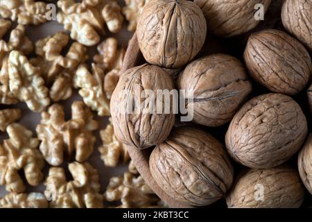 Shelled and peeled walnuts together, top view Stock Photo