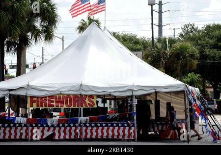 A vendor in a temporary tent sells fireworks for Independence Day celebrations on July 4, 2020 in Orlando, Florida. Sales of personal fireworks have increased this year due to the cancellation of as many as 80 percent of the Fourth of July fireworks displays in large cities due to the coronavirus pandemic. (Photo by Paul Hennessy/NurPhoto) Stock Photo