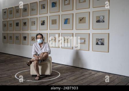 Visitors at Art Exhibition at Hanafi Gallery in Depok West Java, Indonesia, on July 9, 2020. HANAFI the painter exhibit his work during partial lock down that made him stay at home for over 4 months. The art exhibition applied health protocol using mask, distance marking, and face shield (Photo by Donal Husni/NurPhoto) Stock Photo