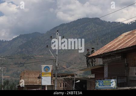 Security personnel stands gaurd during BJP leader Ram Madhav and Jitendra Singhs visit to Bandipora, Jamu and Kashmir, India on 12 July 2020 (Photo by Nasir Kachroo/NurPhoto) Stock Photo