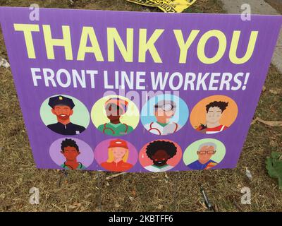 Sign thanking frontline workers during the novel coronavirus (COVID-19) pandemic in Toronto, Ontario, Canada on June 30, 2020. (Photo by Creative Touch Imaging Ltd./NurPhoto) Stock Photo