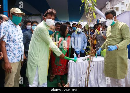 State Urban Development Minister Firhad Hakim( Right), along Rajib Banerjee ( Left to 2nd) State Forest Minister,Baishali Dalmiya , MLA Bally Assembly and Prabir Kumar Ghosal , MLA Uttarpara Assembly at the Plantation tree during the West Bengal Government celebrates Bonomohotsob 2020 and save the Environment in Howrah, West Bengal, India on July 14,2020. (Photo by Debajyoti Chakraborty/NurPhoto) Stock Photo