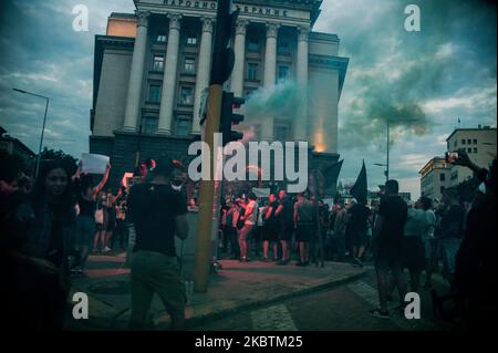 Thousands of people are gathered in the Bulgarian Capital of Sofia to protest against the corruption in Bulgaria. Anti-government protests are held in some of the biggest cities in Bulgaria against the Prime Minister Boyko Borissov, the rulling government and chief prosecutor. People are holding signs against Mafia and corruption in Bulgaria, Sofia, Bulgaria on July 14, 2020. (Photo by Hristo Rusev/NurPhoto) Stock Photo