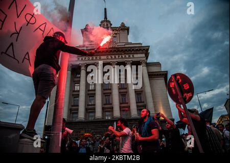 Thousands of people are gathered in the Bulgarian Capital of Sofia to protest against the corruption in Bulgaria. Anti-government protests are held in some of the biggest cities in Bulgaria against the Prime Minister Boyko Borissov, the rulling government and chief prosecutor. People are holding signs against Mafia and corruption in Bulgaria, Sofia, Bulgaria on July 14, 2020. (Photo by Hristo Rusev/NurPhoto) Stock Photo