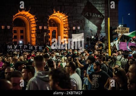 Thousands of people are gathered in the Bulgarian Capital of Sofia to protest against the corruption in Bulgaria. Anti-government protests are held in some of the biggest cities in Bulgaria against the Prime Minister Boyko Borissov, the rulling government and chief prosecutor. People are holding signs against Mafia and corruption in Bulgaria, Sofia, Bulgaria on July 14, 2020. (Photo by Hristo Rusev/NurPhoto) Stock Photo