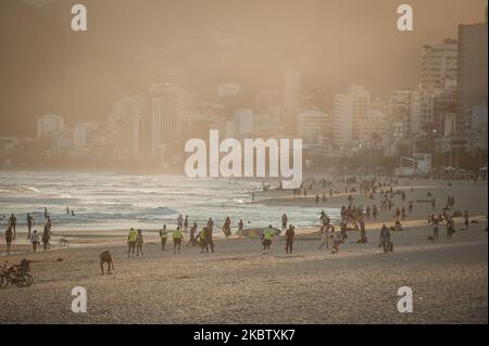 Police officers are seen inspecting the ipanema beach located in the south of the city of Rio de Janeiro, Brazil, on July 19, 2020. Local authorities start the 4th (fourth) of the 6 stages of the easing of social isolation (quarantine) or that allows some collective sports on the beach sand, except on weekends. Rio de Janeiro surpassed the mark of 11,000 deaths caused by coronavirus (COVID-19) and more than 135,000 confirmed cases by the disease. (Photo by Allan Carvalho/NurPhoto) Stock Photo