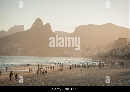 Bathers are seen on the ipanema beach located in the south of the city of Rio de Janeiro, Brazil, on July 19, 2020. Local authorities have started the 4th (fourth) of the 6 stages of easing social isolation (quarantine), which allows for some team sports on the beach except for weekends. Rio de Janeiro surpassed the 11,000 deaths caused by the Coronavirus (COVID-19) and more than 135,000 confirmed cases of the disease (Photo by Allan Carvalho/NurPhoto) Stock Photo