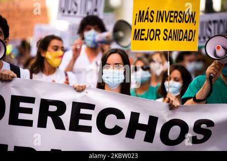 MIR hold a banner, during the second MIR protest in Madrid, in which you can read ''More investment, better health''. They have been on strike for 1 week. On July 20, 2020 in Madrid, Spain. (Photo by Jon Imanol Reino/NurPhoto) Stock Photo