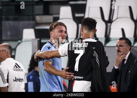 Juventus forward Cristiano Ronaldo 7 talks with Lazio forward Ciro