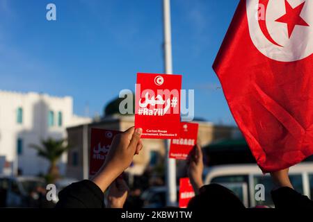 Tunisian protesters shoot slogans during an anti government demonstration at the Kasba in Tunis, Tunisia on November 15, 2013. Around 250 people took part in the protest shouting slogans like ''move along'' (written on the posters as well) and asking the resignation of the ruling Islamist party Ennahda. (Photo by Emeric Fohlen/NurPhoto) Stock Photo