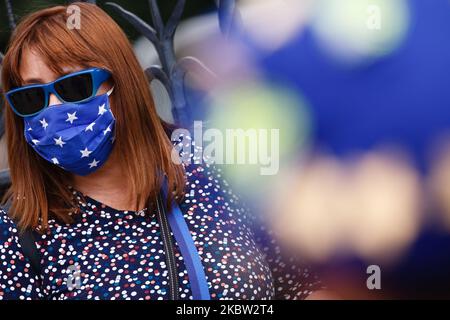An anti-Brexit activist wearing a face mask resembling the EU flag demonstrates outside the Houses of Parliament in London, England, on July 22, 2020. Yesterday saw the publication of the long-awaited Intelligence and Security Committee (ISC) report on Russian activity in the UK, which includes among its assertions the claim that the British government 'actively avoided' investigating possible Russian interference in the 2016 referendum on EU membership. (Photo by David Cliff/NurPhoto) Stock Photo