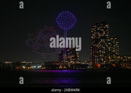 Over 500 drones display a light show over the Hudson River to celebrate the 10th anniversary of the mobile game Candy Crush Saga on November 3, 2022 i Stock Photo