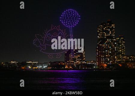 Over 500 drones display a light show over the Hudson River to celebrate the 10th anniversary of the mobile game Candy Crush Saga on November 3, 2022 i Stock Photo