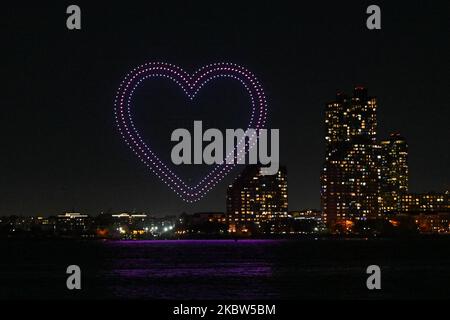 Over 500 drones display a light show over the Hudson River to celebrate the 10th anniversary of the mobile game Candy Crush Saga on November 3, 2022 i Stock Photo