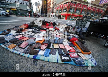 Street vendors sell counterfeits goods like bags, sunglasses, belts and  watches on Canal street and Broadway corners in New York on November 9,  2020. (Photo by Lev Radin/Sipa USA Stock Photo - Alamy