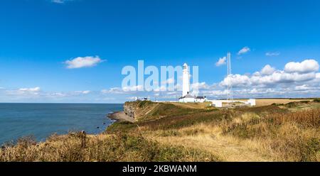 A panorama of the Nash Point Lighthouse and Monknash Coast in South Wales Stock Photo