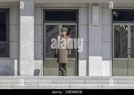 Feb 18, 2017-Paju, South Korea-North Korean soldier stand guard to truce village at Panmunjom in Paju, South Korea. (Photo by Seung-il Ryu/NurPhoto) Stock Photo