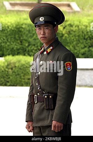 May 20, 2003-Paju, South Korea-North Korean soldiers stand guard at truce village Panmunjom in the demilitarized zone which seperates the North from South Korea May 20, 2003. Swiss Foreign Minister Micheline Calmy-Rey, making a rare crossing of the heavily fortified border between North and South Korea, offered her neutral country's help in settling the Korean nuclear crisis. (Photo by Seung-il Ryu/NurPhoto) Stock Photo