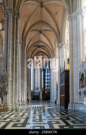 Amiens, France - 12 September, 2022: view of the side nave leading to the ambulatory inside the Amiens Cathedral Stock Photo