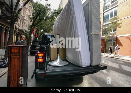 A view of a moving truck as New York City enters Phase 4 of re-opening following restrictions imposed to slow the spread of coronavirus on July 30, 2020 in New York City. The fourth phase allows outdoor arts and entertainment, sporting events without fans and media production. New Yorkers Look To Suburbs And Beyond. Other City Dwellers May Be Next. (Photo by John Nacion/NurPhoto) Stock Photo