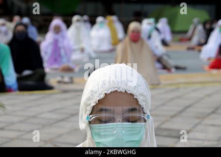 Azhar Mask Indonesian muslims wearing protective face shield and mask, and keep ...