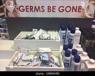 Face masks and disinfectant to protect her from the novel coronavirus (COVID-19) at a shop in Toronto, Ontario, Canada on July 30, 2020. (Photo by Creative Touch Imaging Ltd./NurPhoto) Stock Photo