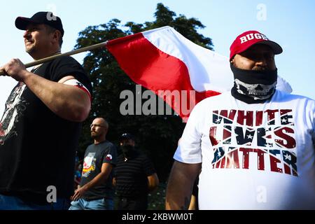 A mna wearing 'White Lives Matter' t-shirt takse part in far-right march during the 76th anniversary of the Warsaw Uprising. Krakow, Poland on 1st August, 2020. The Warsaw Uprising was a major World War II operation which started on 1st August 1944, by the Polish underground resistance, led by the Polish resistance Home Army (Polish: Armia Krajowa), to liberate Warsaw from German occupation. (Photo by Beata Zawrzel/NurPhoto) Stock Photo