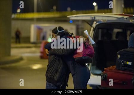 Families reunite with their close ones in El Dorado international Airport after flights were grounded in Colombia due to the novel coronavirus pandemic on August 1 2020 in Bogota, Colombia. (Photo by Sebastian Barros/NurPhoto) Stock Photo