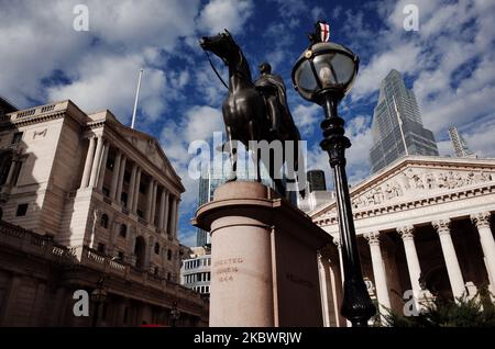 The equestrian statue of the Duke of Wellington stands in front of the Bank of England (left) at Bank Junction in the City of London financial district in London, England, on August 5, 2020. The Bank of England's Monetary Policy Committee will announce its next interest rate decision tomorrow, August 6. (Photo by David Cliff/NurPhoto) Stock Photo