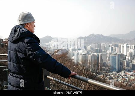 March 11, 2018-Seoul, South Korea-French Auther and Professor Jean-Marie Le Clezio and his travel team visit Namsan Mountain Park and Tower in Seoul, South Korea. (Photo by Seung-il Ryu/NurPhoto) Stock Photo