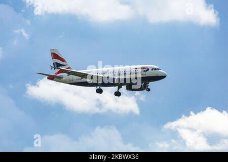British Airways Airbus A319 aircraft as seen flying on final approach for landing at Amsterdam Schiphol AMS EHAM international airport in the Netherlands on July 2, 2020. The narrow body Airbus A319 airplane has the registration G-EUOE and is powered by 2x IAE V2522-A5 jet engines. BA BAW is connecting the Dutch city to London City, Gatwick and Heathrow airports. BA is the flag carrier of the United Kingdom with headquarters and hub in London, The airline is member of Oneworld aviation alliance England. (Photo by Nicolas Economou/NurPhoto) Stock Photo