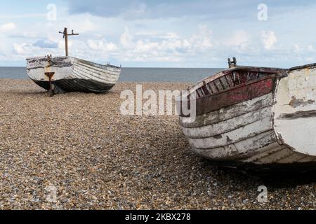 Aldeburgh pebble beach with boats Suffolk England UK Stock Photo