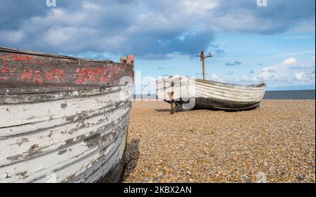 Aldeburgh pebble beach with boats Suffolk England UK Stock Photo