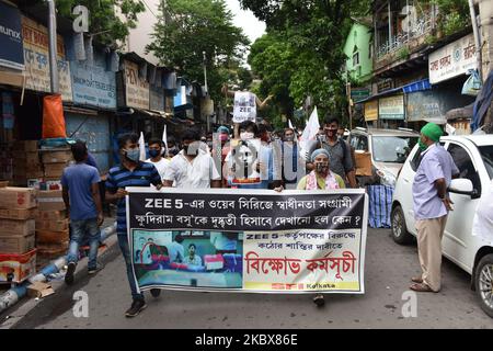 People protest against Zee5 in Kolkata, India, on August 17, 2020. Zee5 presents a web series ''Abhay-2'' In which the youngest Bengali freedom fighter, martyr of India's freedom struggle who was executed by the British government. Khudiram Bose's photograph has been used as one of the fugitive local criminal in second episode of the second season of the series in a 'police interrogation scene' which contains photographs of local criminals. Protest was organised by the Students Federation of India. (Photo by Sukhomoy Sen/NurPhoto) Stock Photo