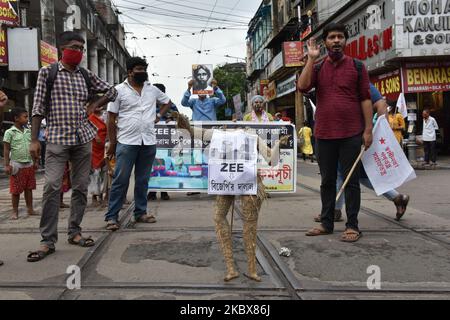 People protest against Zee5 in Kolkata, India, on August 17, 2020. Zee5 presents a web series ''Abhay-2'' In which the youngest Bengali freedom fighter, martyr of India's freedom struggle who was executed by the British government. Khudiram Bose's photograph has been used as one of the fugitive local criminal in second episode of the second season of the series in a 'police interrogation scene' which contains photographs of local criminals. Protest was organised by the Students Federation of India. (Photo by Sukhomoy Sen/NurPhoto) Stock Photo