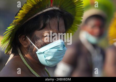 KayapÃ³ indigenous people from the 'BaÃº' and 'Menkragnoti' villages, near the city of Novo Progresso, in the south of ParÃ¡, Brazil, on August 17, 2020 , block the BR-163 highway in protest against the lack of resources to combat COVID-19, and claiming dialogue by part of the government in the plans of the FerrogrÃ£o, a railway project for transporting grains between connecting the Midwest region to the port of Mirituba, in the north of the state of ParÃ¡, on Monday morning, on August 17, 2020. (Photo by Ernesto CarriÃ§o/NurPhoto) Stock Photo