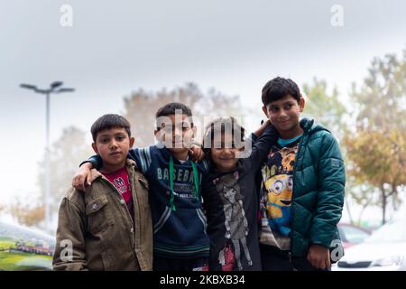 Belgrade, Serbia - November 02, 2022: Group of cute gypsy kids in Belgrade. Serbian Roma children are living in poverty. Help people in need Stock Photo