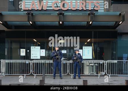 Armed police officers stand guard outside Christchurch High Court prior to the second day of the four-day sentencing hearing of Brenton Harrison Tarrant in Christchurch, New Zealand, on August 25, 2020. Australian white supremacist Tarrant, 29, who carried out the attack on two mosques on 15 March 2019, will be sentenced on 51 counts of murder, 40 of attempted murder and one charge under the Terrorism Suppression Act. (Photo by Sanka Vidanagama/NurPhoto) Stock Photo