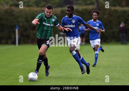 Oldham Athletic's Junior Luambo and Rochdale's Eoghan O'Connell during the Pre-season Friendly match between Oldham Athletic and Rochdale at Chapel Road, Oldham, England on August 25, 2020. (Photo by Eddie Garvey/MI News/NurPhoto) Stock Photo