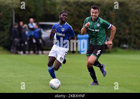 Oldham Athletic's Junior Luambo and Rochdale's Eoghan O'Connell during the Pre-season Friendly match between Oldham Athletic and Rochdale at Chapel Road, Oldham, England on August 25, 2020. (Photo by Eddie Garvey/MI News/NurPhoto) Stock Photo