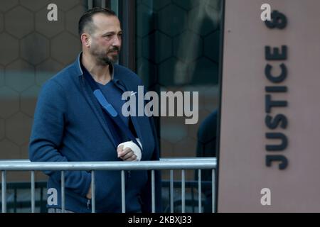 Temel Atacocugu (C), a survivor of the twin mosque shootings arrives at Christchurch High Court prior to the third day of a four-day sentencing hearing for Brenton Harrison Tarrant in Christchurch, New Zealand, on August 26, 2020. Australian white supremacist Tarrant, 29, who carried out the attack on two mosques on 15 March 2019, will be sentenced on 51 counts of murder, 40 of attempted murder and one charge under the Terrorism Suppression Act. (Photo by Sanka Vidanagama/NurPhoto) Stock Photo