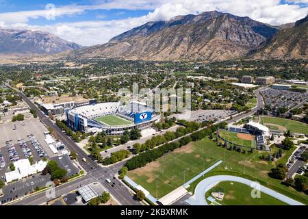 Aerial view of Brigham Young University's Lavell Edwards Stadium  at base of Wasatch Range of rocky mountains, Provo, Utah Stock Photo