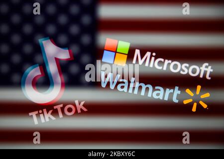 TikTok, Microsoft and Walmart logos and American flag are seen displayed on a screens in this multiple exposure illustration photo taken on September 1, 2020. Microsoft and Walmart in joint bid are listed as companies that may purchase tiktok. (Photo Illustration by Jakub Porzycki/NurPhoto) Stock Photo